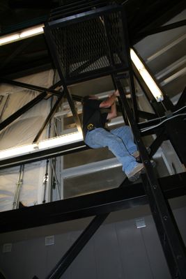 Staff member adjusting the telescope